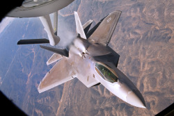 flying-fortress:  A U.S. Air Force F-22 Raptor backs away from