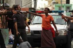  Haitian mother protecting her son in Dominican Republic 