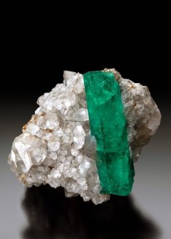 hematitehearts:  Beryl var. Emerald on Calcite with PyriteSize: