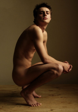 The proud, cocky young model had no problem getting down on his haunches to show off his slender physique. Little did he know that once the photographer&rsquo;s hypnotic camera flashed, the pompous model would be poised in the perfect position to start