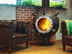 iheartart6:  sixpenceee:  Fireplace made from an old naval mine