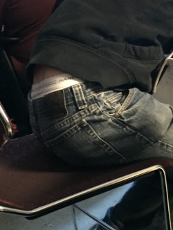 undiesfetish:  cheapbriefs:  Saw this a day ago. Love seeing a tighty whities waistband in public. ;)  Love this too   Peek a Boo!What a great image. This pic is not just a snapshot, itâ€™s a sense memory. I imagine myself in the library trying to study.