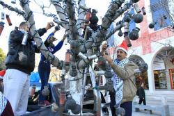 nowinexile:  Christmas tree getting decorated in Bethlehem-Palestine