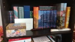 My Harry Potter shelf. You can see my Hogwarts letter in there