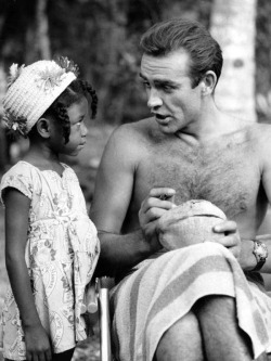 the60sbazaar:  Sean Connery signing an autograph on set in Jamaica 