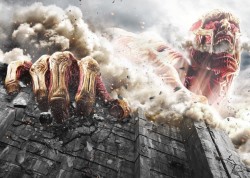 Promotional still of the Colossal Titan in the upcoming SnK live