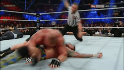 Brock is pinching Punk’s ass! O.O