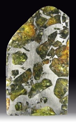 mineralists:  Pallasite is a variety of Meteorite that has Olivine