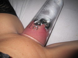 A pierced pussy being well pumped. There is even a scale on the