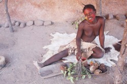 A Namibian Damara woman making traditional medicine. Via the Namibian Sun.