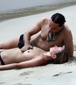 toplessbeachcelebs:  Kate Moss (Model) sunbathing topless in