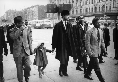 twixnmix:    Malcolm X with his daughter Qubilah Shabazz   in Harlem   on February 20, 1965.  He was assassinated the next day at the Audubon Ballroom in front of his wife and children.(Photos by Duilio Pallottelli)  Brother Malcolm 