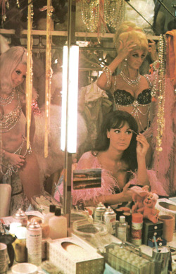 1973mraversion:  Las Vegas showgirls prep costumes and make up.