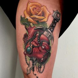 tattoosnob:  Heart & Dagger tattoo by @aaron_springs at @reddaggertattoo