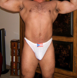 wrestlerswrestlingphotos:  huge musclebear posing gstring seminude