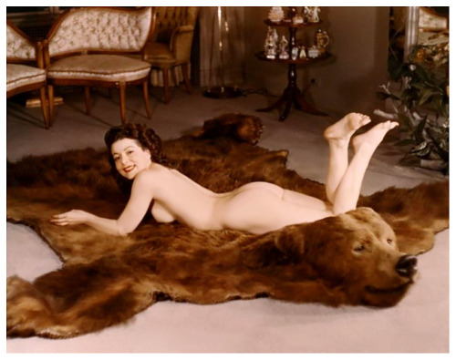 Rose La Rose        (aka. Rosina Dapello) Relaxing on her Grizzly bearskin rug..