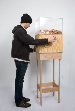 canarycoal:  merryplz:  andrewfishman:  Blake Fall-Conroy, “Minimum Wage Machine,” 2008-2010 This machine allows anyone to work for minimum wage for as long as they like.  Turning the crank on the side releases one penny every 4.97 seconds, for a