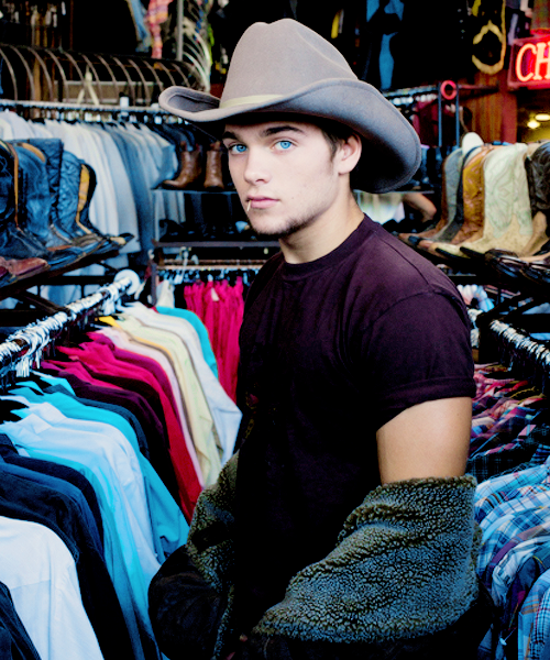 itsflyinglikeadragon:  He was browsing the stupidly large costume shop and thought of trying on the cowboy hat. It looked kinda daft, but he kinda liked it. In the mirror he noticed his eyes were a very different colour to their normal brown. He also