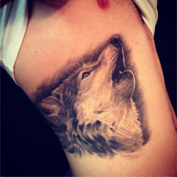 fuckyeahtattoos:  My wolf in remembrance of my dog and symbolizing