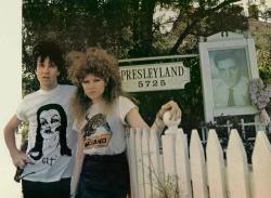  Lux Interior wearing a Vampira shirt with Poison Ivy at “Presley