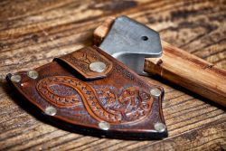 beastmancaravan:  One of my axes and the first axe sheath I made