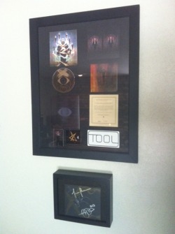 Got my TOOL Opiate reissue framed today,put the autographed jacket