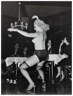 Rita Grable shakes things up, during a performance at an unidentified