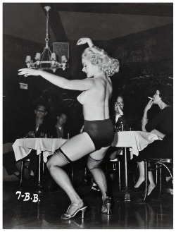 Rita Grable Busts a few moves, during a performance at an unidentified