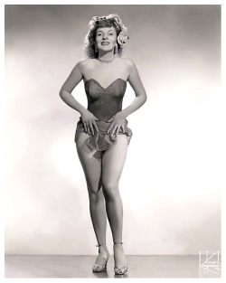 Gloria Marlowe         aka. “Flame”..