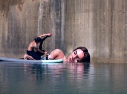 itscolossal:  Artist Sean Yoro Paints Meticulous Seaside Murals While Balancing on His Surfboard