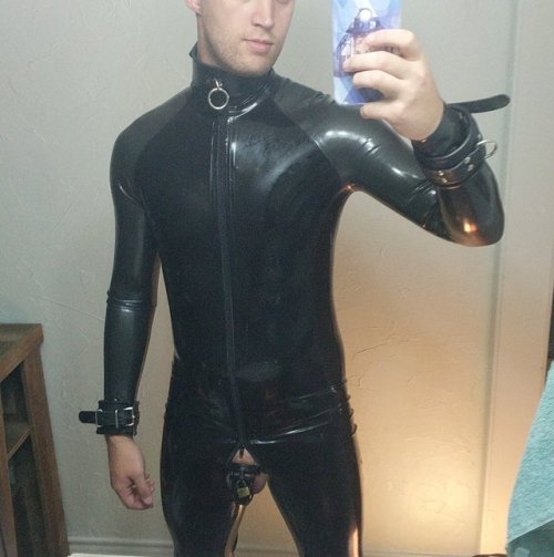 The first implanted suggestion was to begin to wear rubber, feeling as if he were born to it. Next came the order to lock his cock, creating a feeling servitude and submission. Once he began sending regular selfies to his master, he fully became a hypnoti