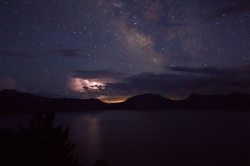 space-pics:  Milky Way and lightning over Crater Lake [4935x3282][OC]http://space-pics.tumblr.com/