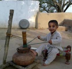 mypunjabistory:  mama-panther:  Little boy making lassi in Punjab,