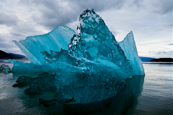 nubbsgalore:  the submerged underside of an iceberg becomes revealed