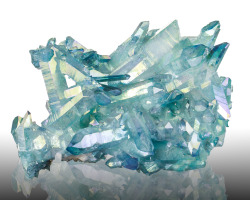 fuckyeahmineralogy:  Aqua Aura Quartz; Arkansas Like Rainbow