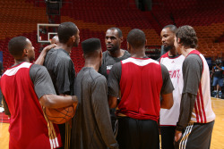 nba:  LeBron James of the Miami Heat talks to the team during