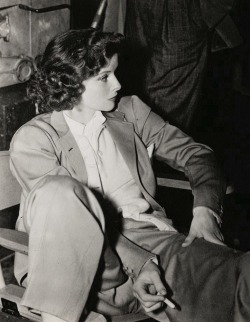 summers-in-hollywood: Katharine Hepburn smoking on the set of