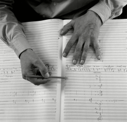 barcarole:   Hands of German composer Carl Orff with his score