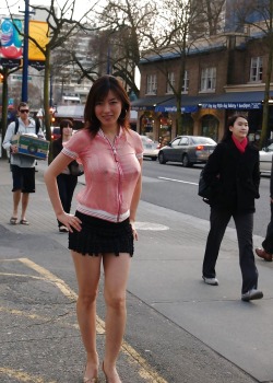 carelessnaked:  Asian girl in transparent shirt, showing her boobs in a public road 