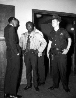 Miles Davis covered in blood after an altercation with police