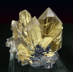 mineralists:  Quartz with Rutile and Hematite