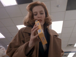 ursulastrausss:  Scully looking good while eating choco droppings.