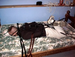 leatherbdsm:STRAIGHT JACKET & HOGTIED  Pull the arms of