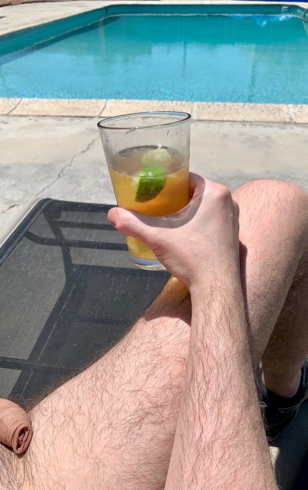 uncutboxerguy:Sunday afternoon beer by the pool. 
