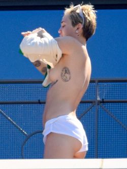 celebrity-nudes-leaked:  Miley Cyrus Caught Topless on a Balcony!