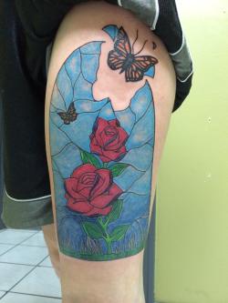 fuckyeahtattoos:  Stained glass rose window with the monarch