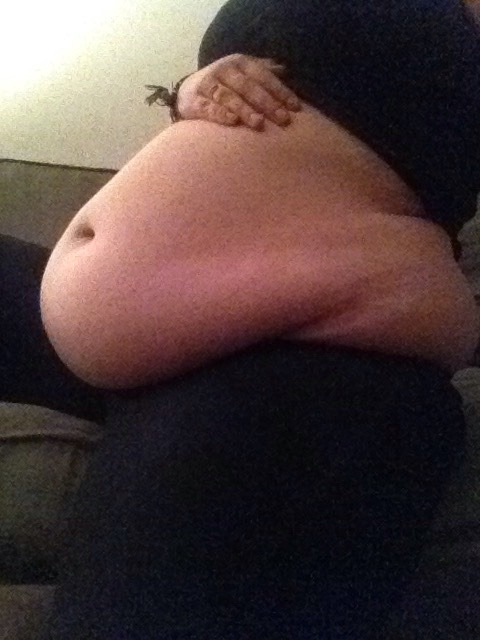shinryuken3091: stuffedbellygirl18:  The most I can do without leaving the couch, my biggest shirts barely fit anymore!!  Gorgeous 