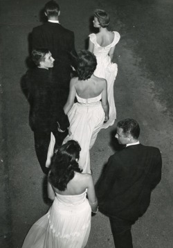 charles-hardin-holley:  College students walking to a dance,