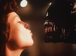 humanoidhistory:  Sigourney Weaver plays kissy-face with the