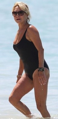I love black one piece suits on mature women especially if there